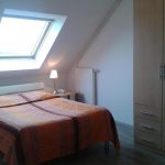 lit double sous velux et penderie